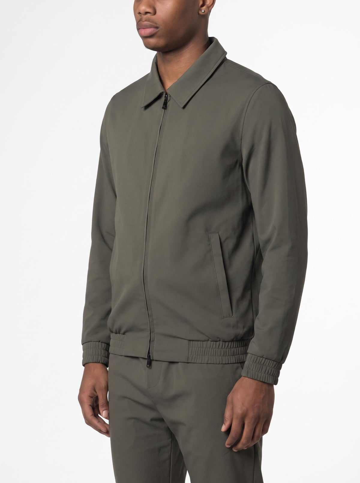 Technical Jacket - Green — three-quarter view
