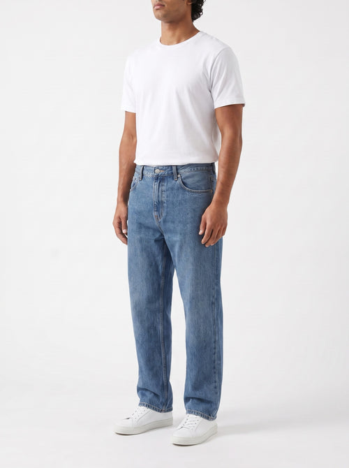 Classic Straight Jeans in Washed Indigo Denim — three-quarter view